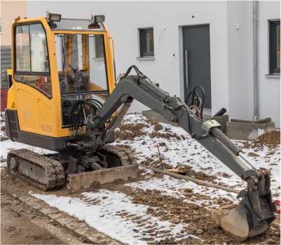 kleiner gelber Bagger